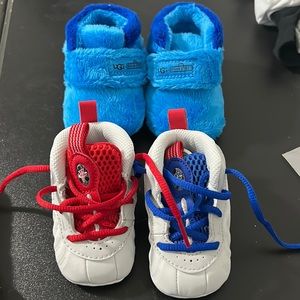 2 pairs of baby shoes 2c.Nike foamposites and Sesame Street uggs.$40 for both.